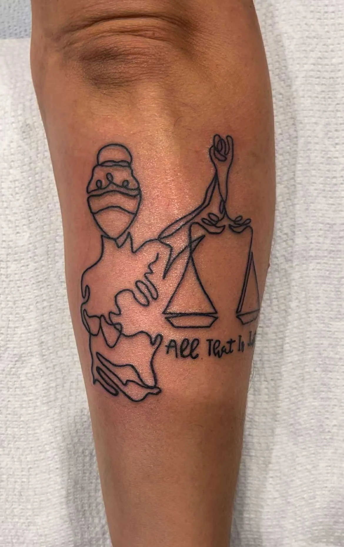 Fine line scales of justice with all that is text tattoo legal symbolic design