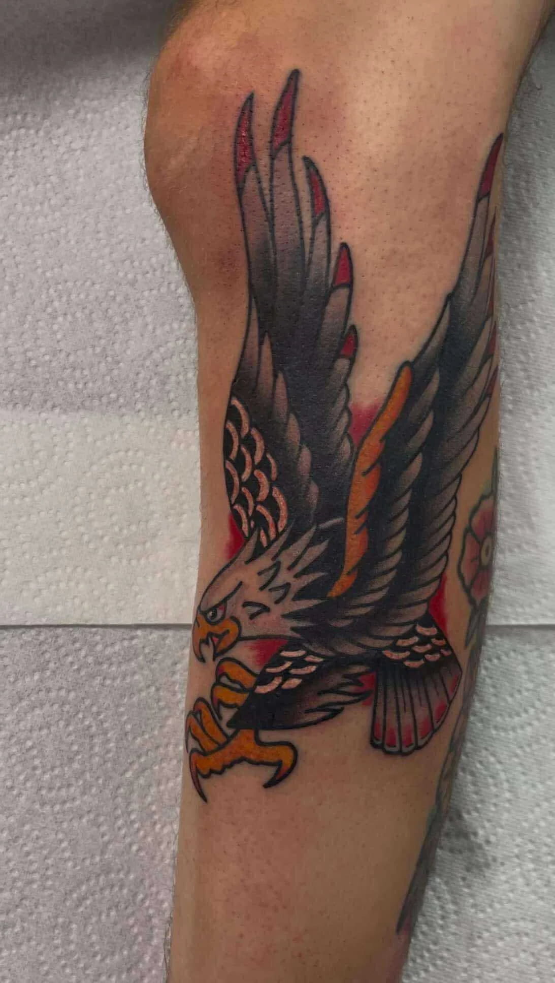 Traditional dragon sleeve tattoo with flowing design and classic elements