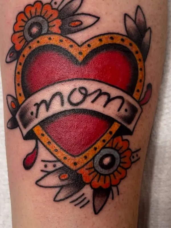 Traditional heart with mom banner tattoo in classic American traditional style
