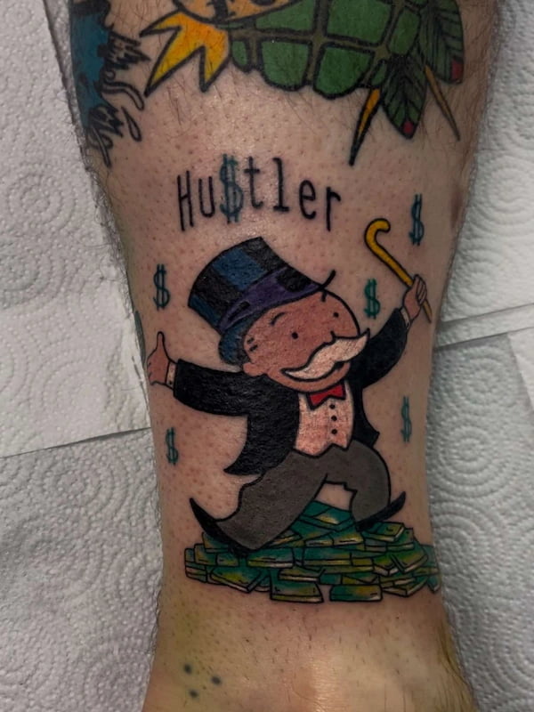Traditional Monopoly themed tattoo with game elements in classic style