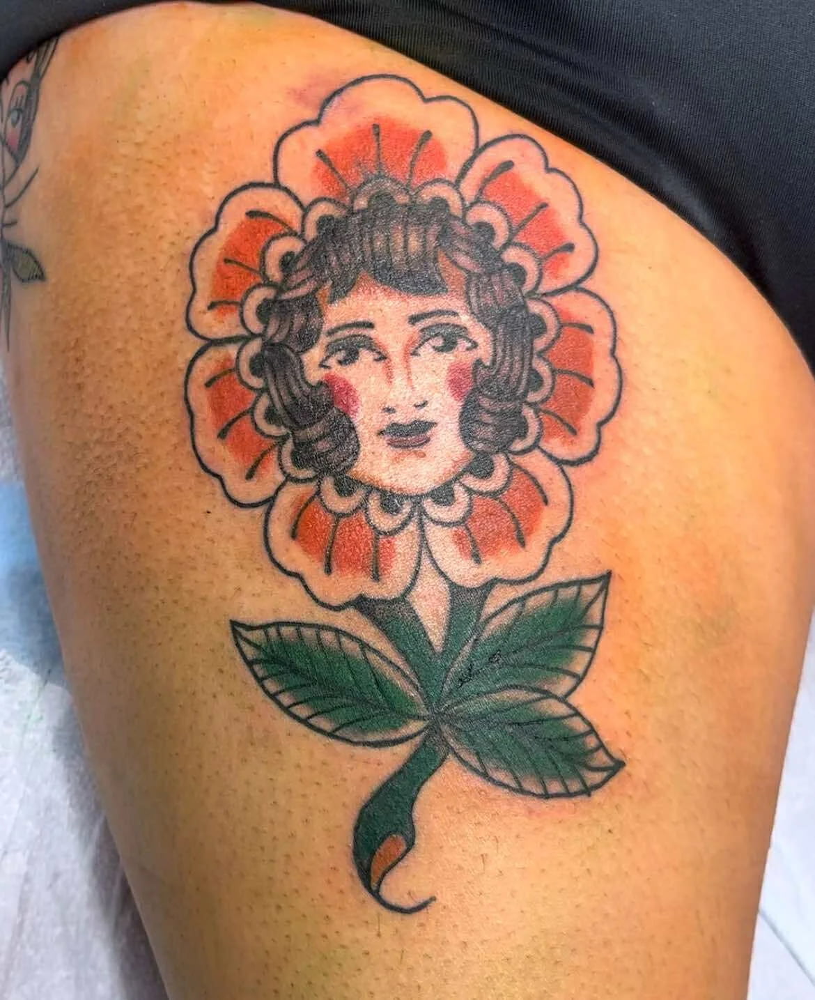 Traditional phoenix bird tattoo with rising flames and rebirth symbolism